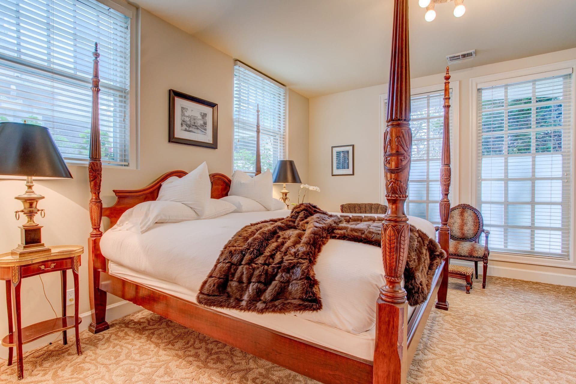 Four-poster bed and seating in the Abe & Mary Room