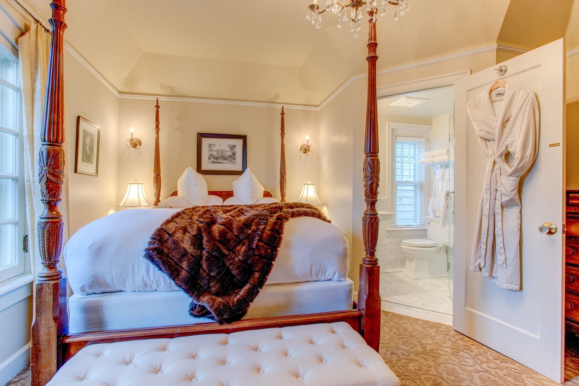 Four-poster bed and white ottoman in the Teddy & Edith Room